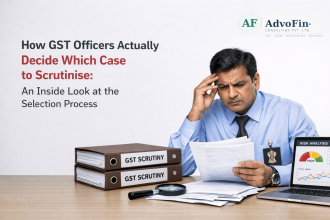 A GST officer reviewing scrutiny files and risk analysis data on a laptop, representing the GST case selection and scrutiny process in India - AdvoFin Consulting Pvt. Ltd.